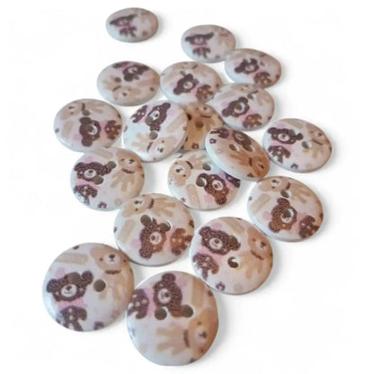 Round buttons with teddy bear designs.