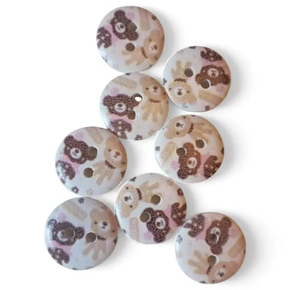 Round, teddy bear patterned buttons.