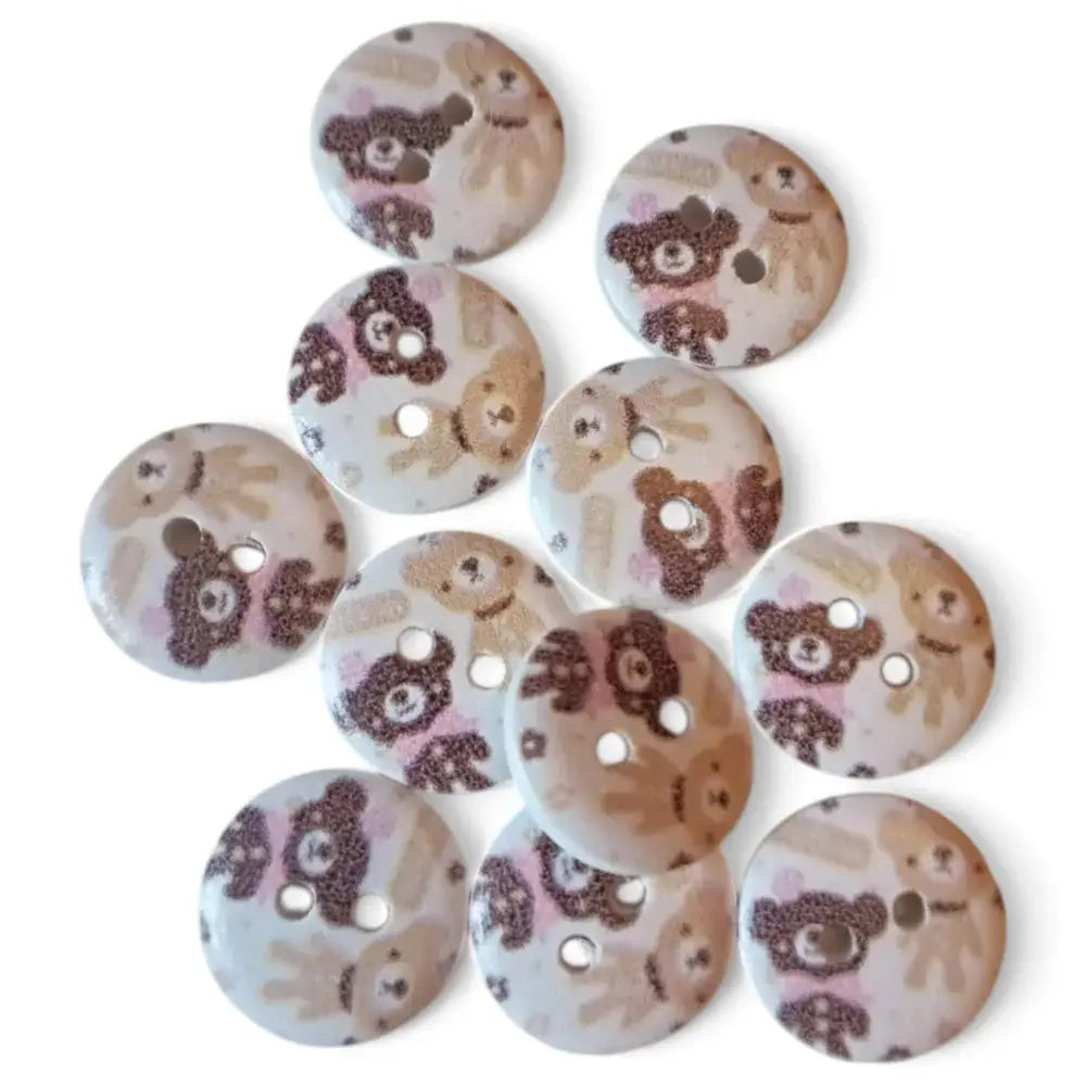 Round, teddy bear-patterned buttons.