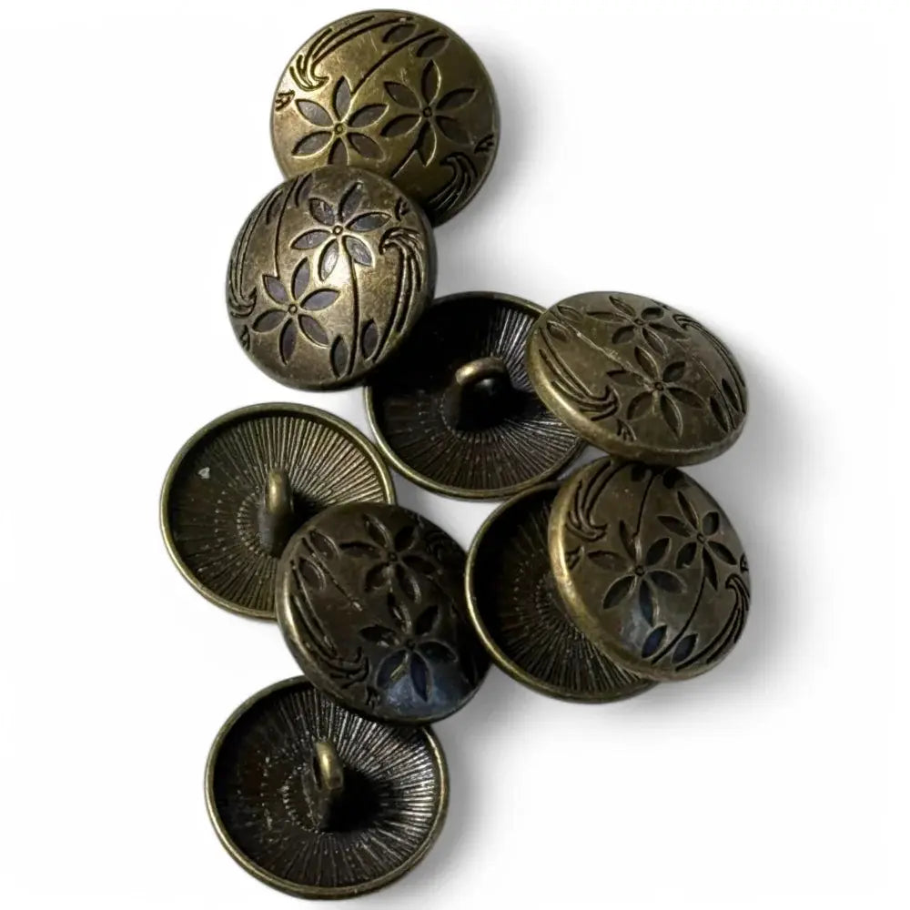 Antique-style floral patterned buttons.