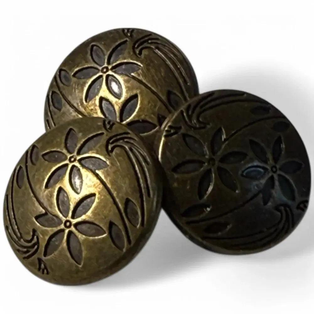 Three antique-style flower buttons.