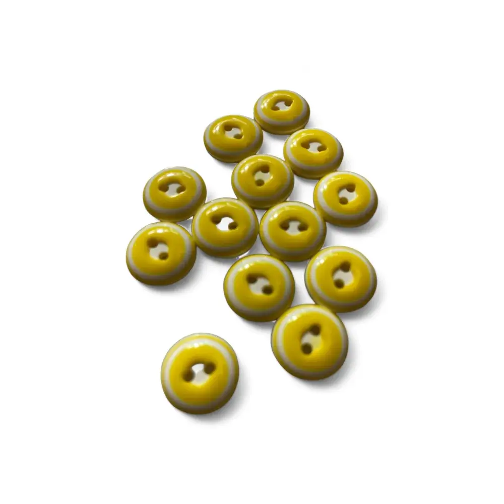 Yellow and white two-hole buttons.