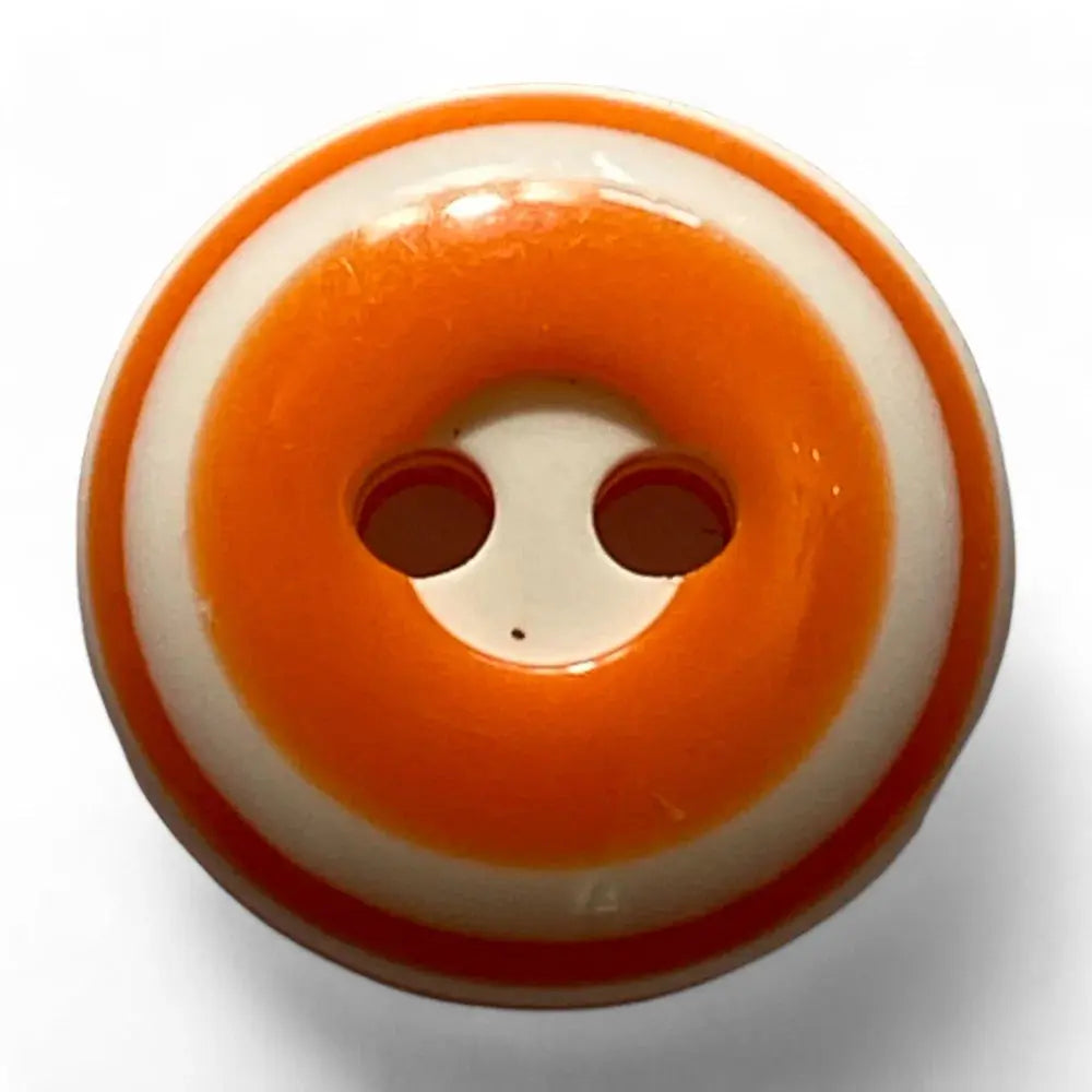 Orange and white striped button.