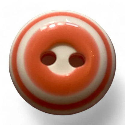 Striped orange and white button.