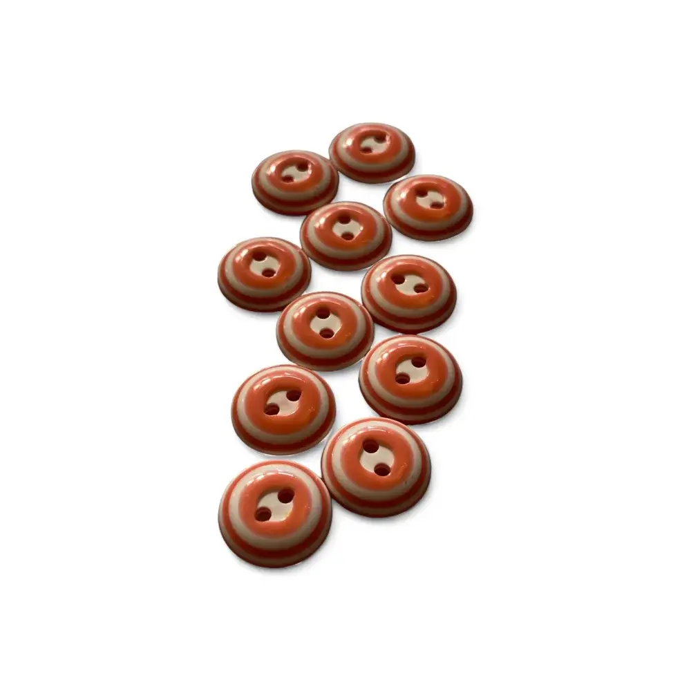 Striped orange and white buttons.