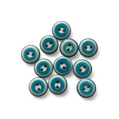 Collection of blue and white buttons.