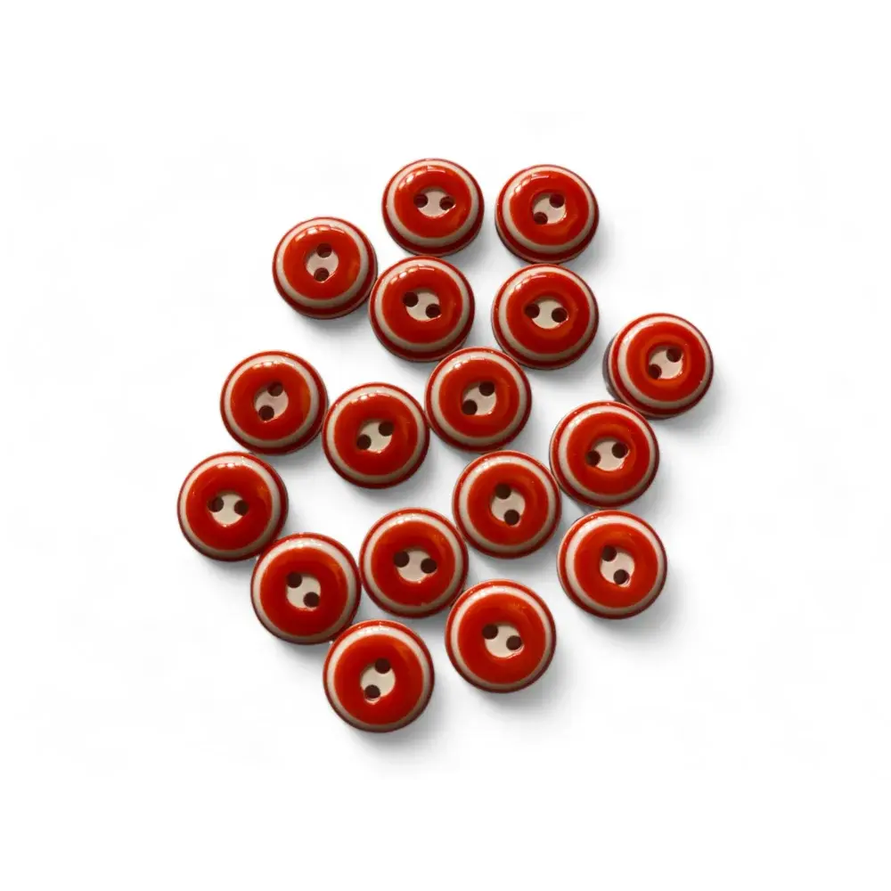 Red and white two-hole buttons.