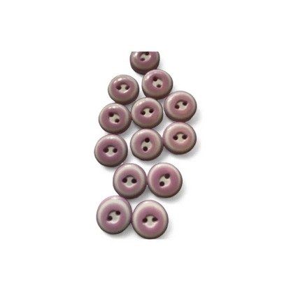 Collection of mauve buttons.