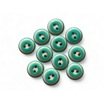 Turquoise and cream two-hole buttons.