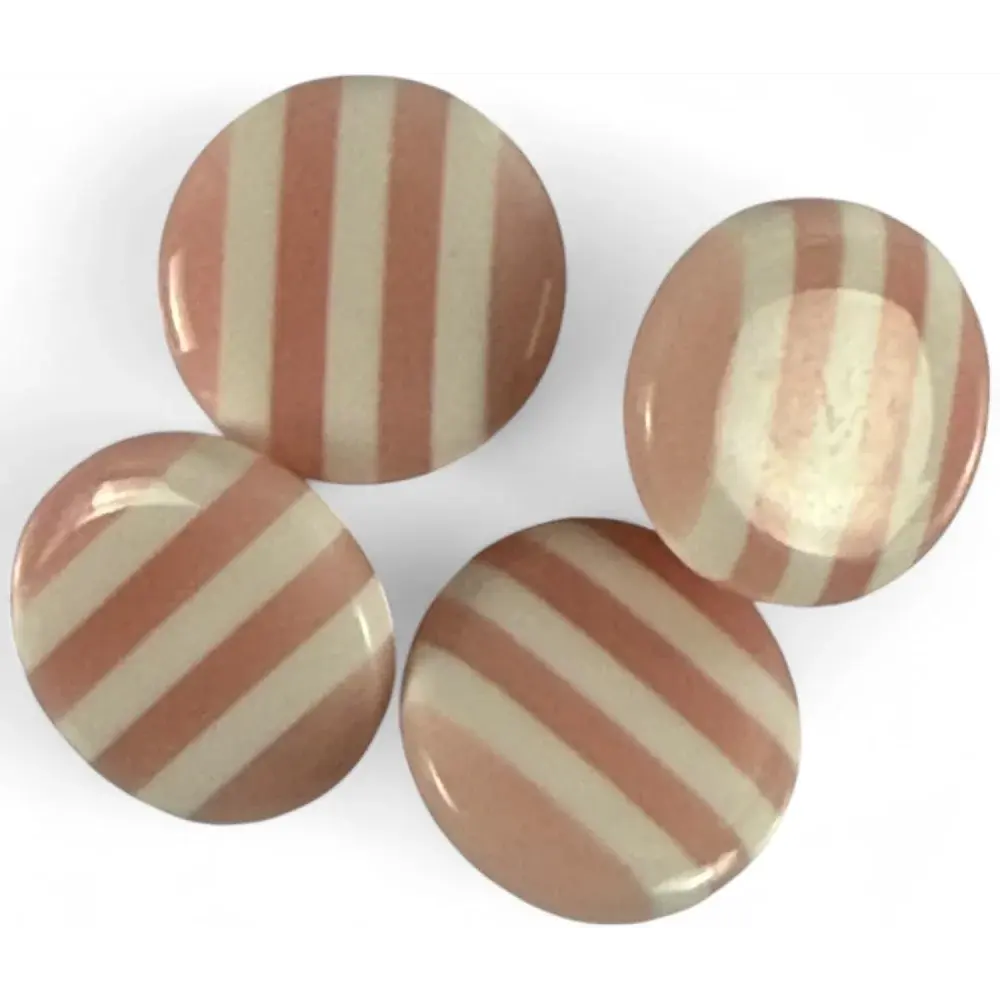 Four striped pink and white candies.